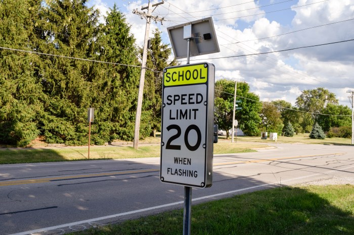 School speed limit zone flashing sign when signs channahon