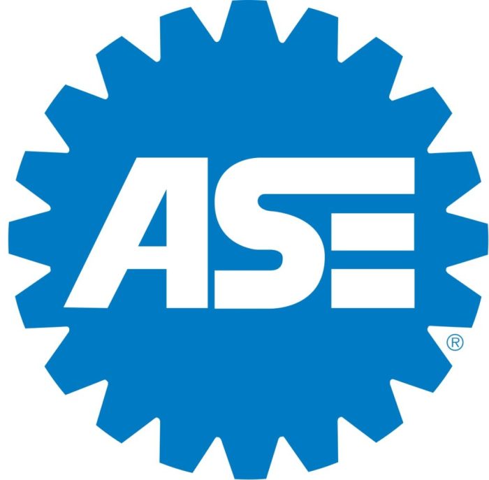 Two technicians are discussing ase certification